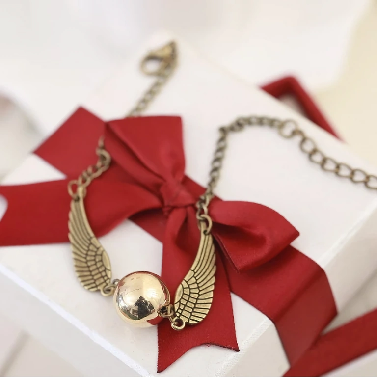 Tématický náramek z série Harry Potter – model se Snitchem